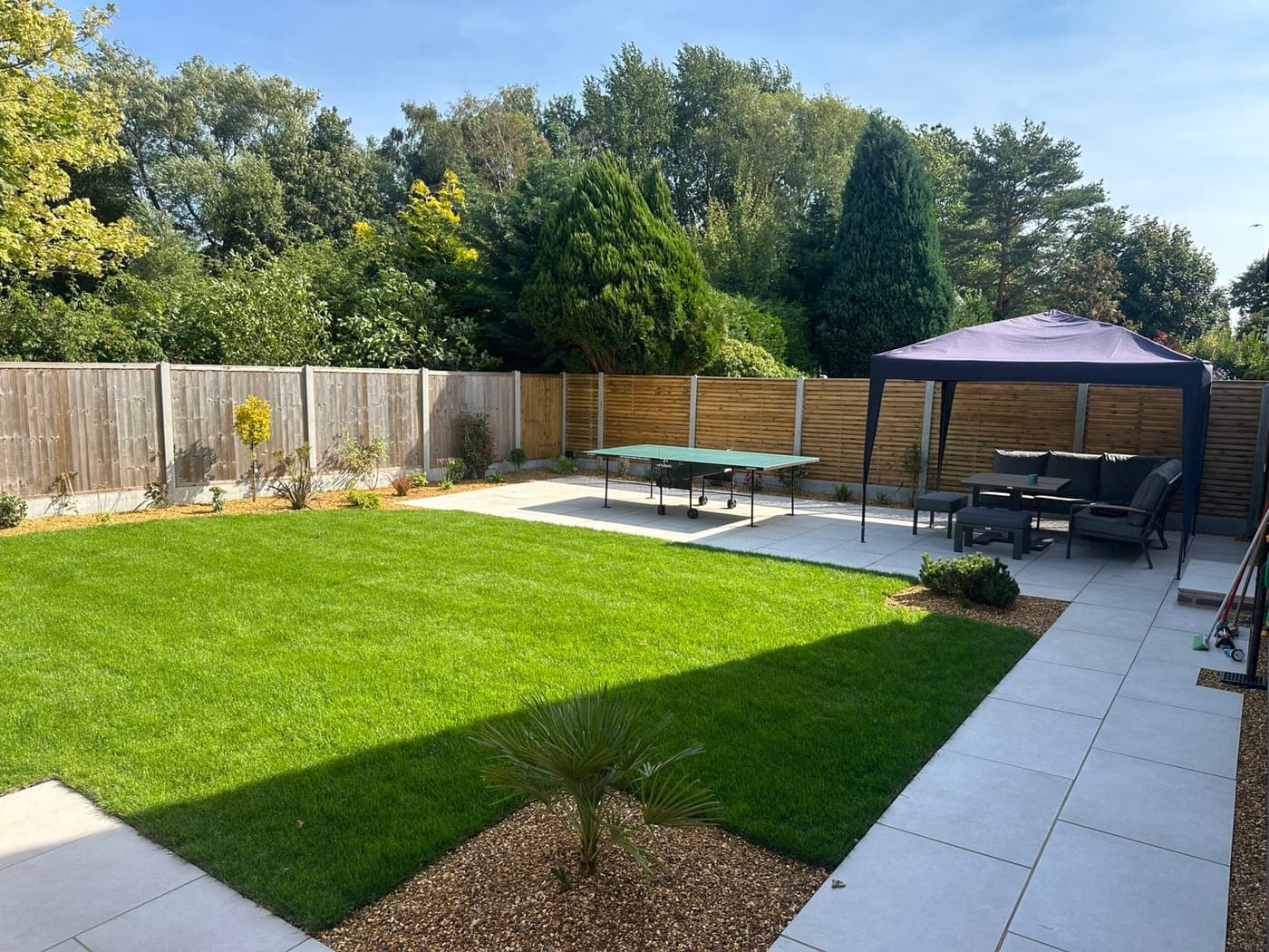 Completed garden transformation on Burfold Close, Wilmslow, with new patio and landscaping