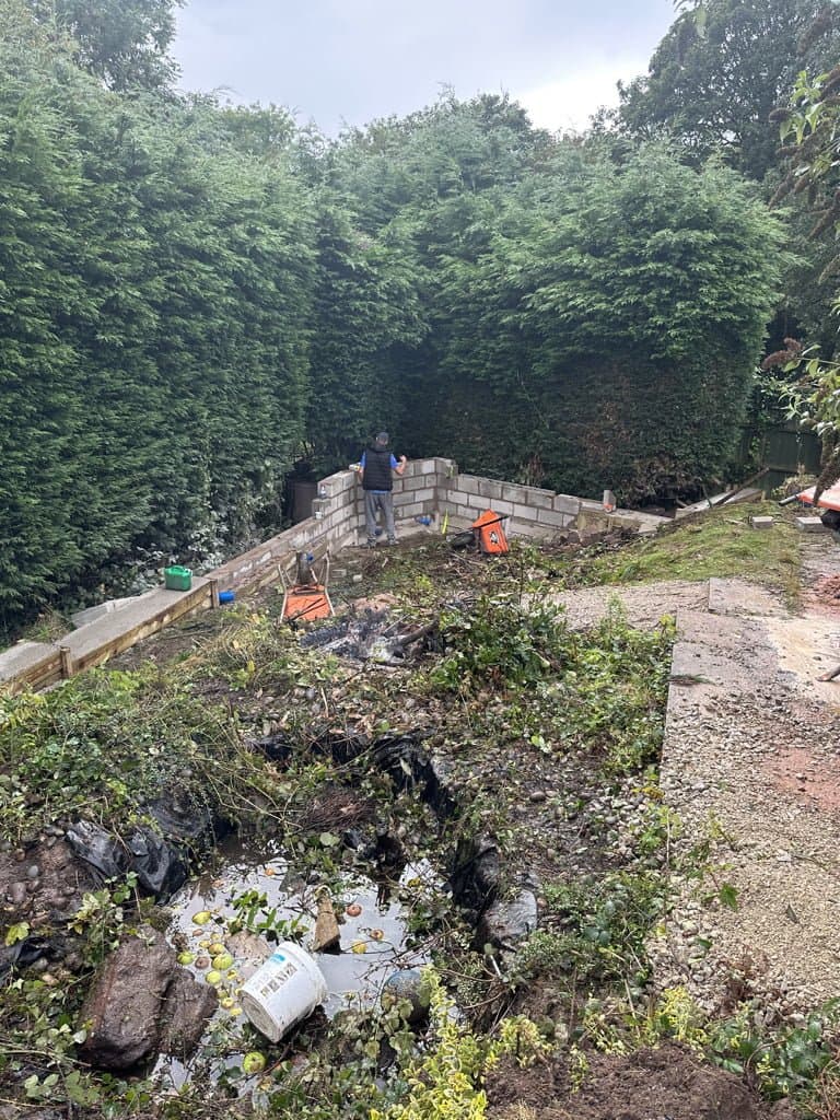 Stepped concrete footing under construction for the Somerset Close retaining wall