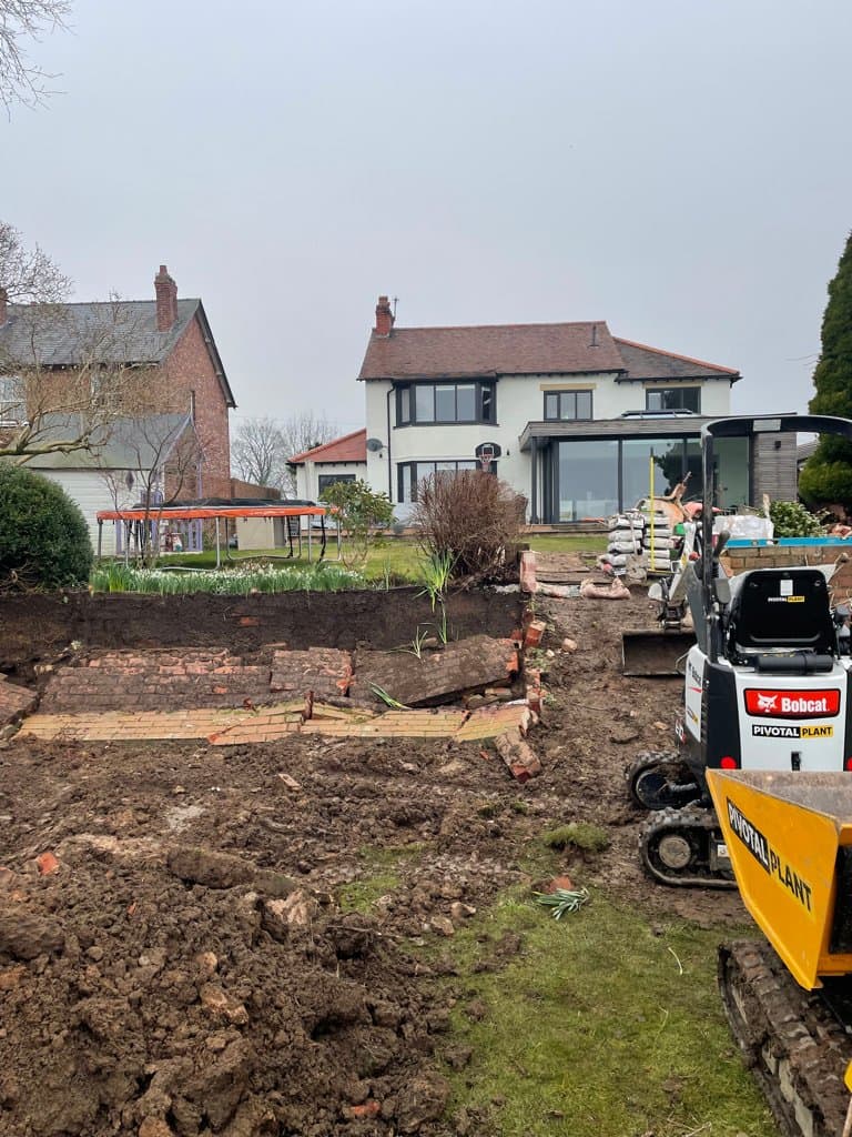 Porcelain paving being laid on the upper tier of the Knutsford Road, Wilmslow garden
