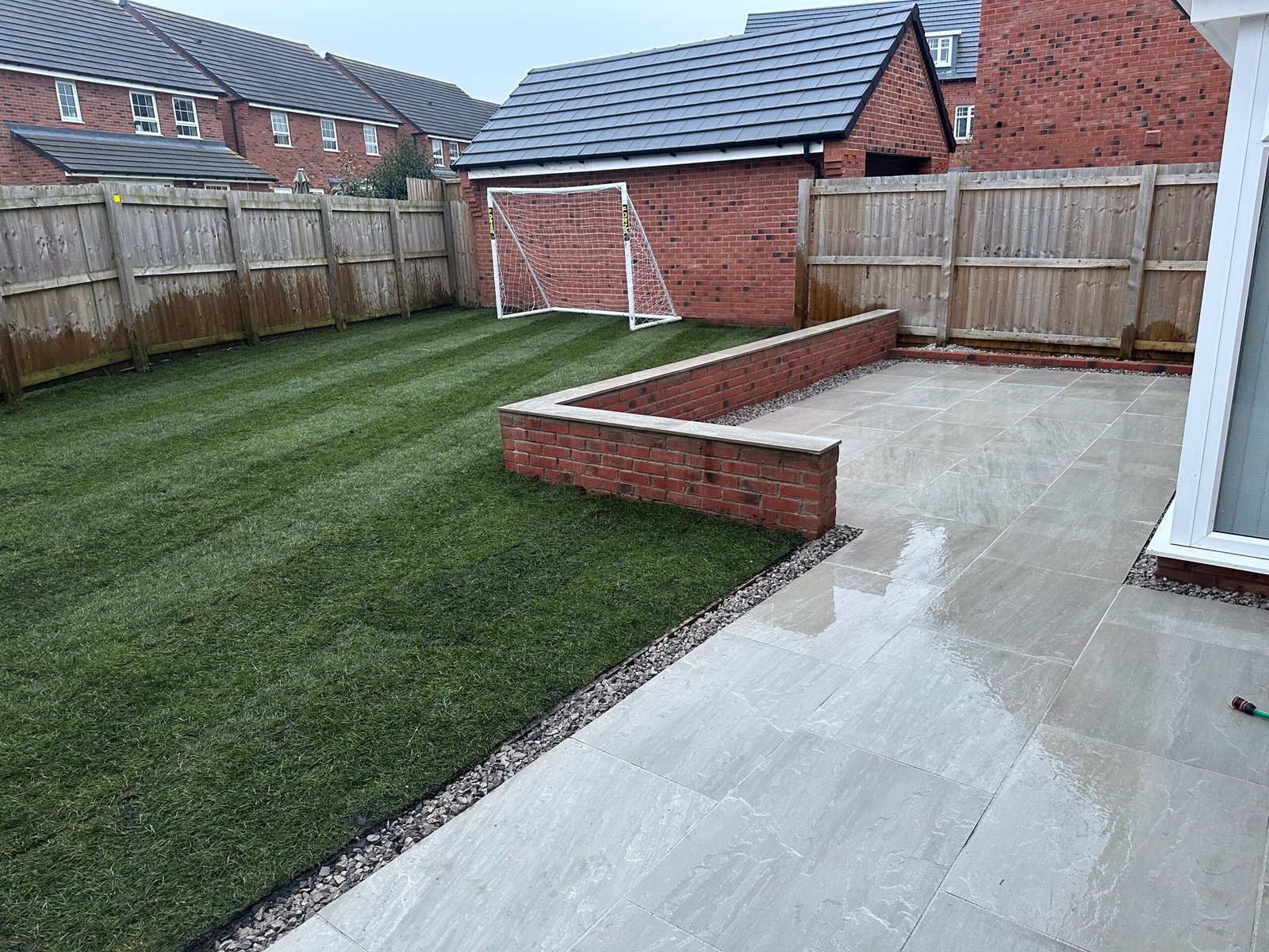 Finished garden lawn and patio by Cheshire Landscape Gardener