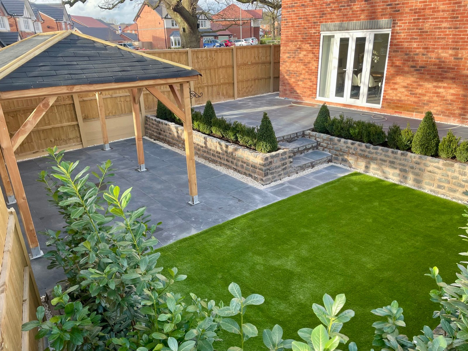 Finished lawn and patio garden by Cheshire Landscape Gardener
