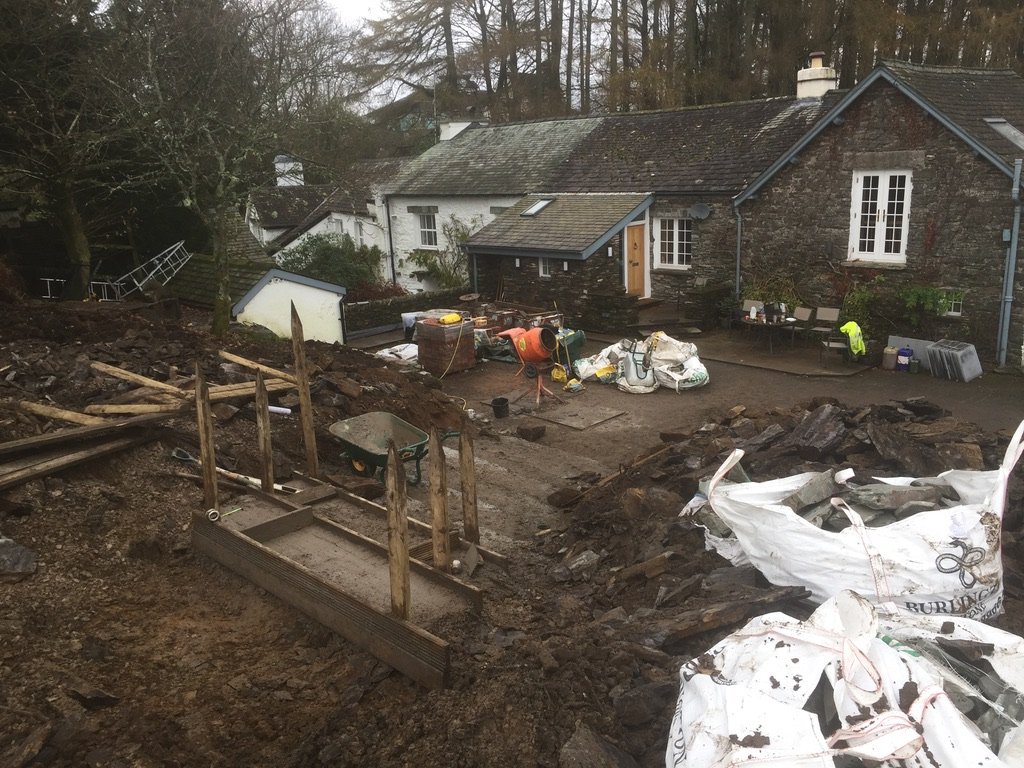 Before garden design project at Crook Lane Windermere showing sloped lawn and uneven levels