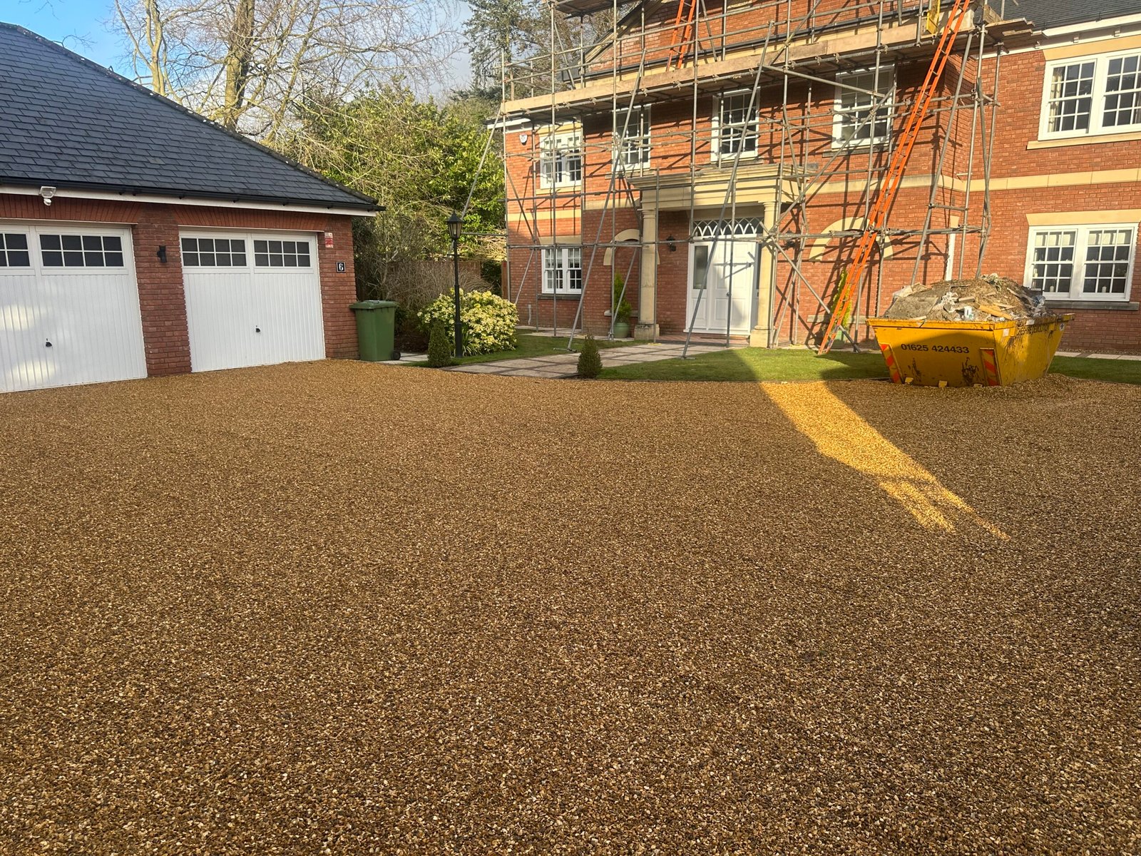 Resin bound driveway installation by Cheshire Landscape Gardener